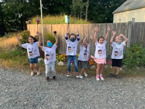 a group of children posing for a photo