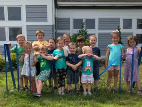 a group of children posing for a photo