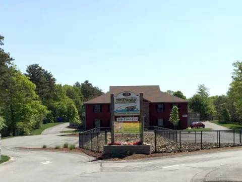 a building with a sign in front of it