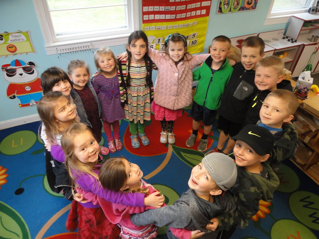 a group of children posing for a photo