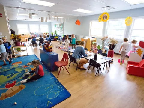 a group of people playing in a room