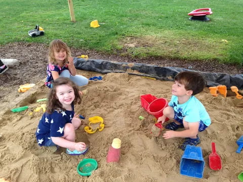 children playing in the sand