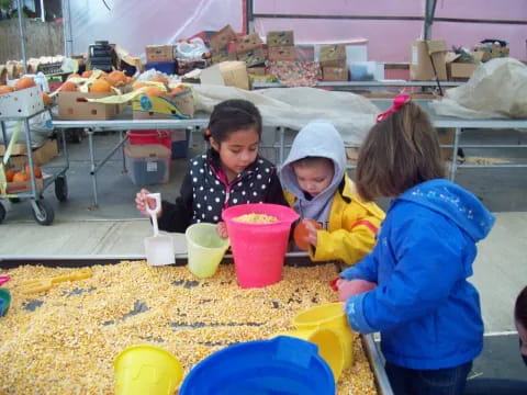 a group of children making a project