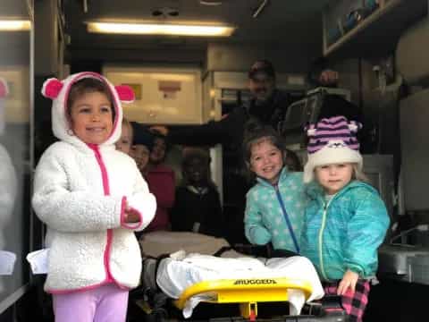 a group of children in a bus