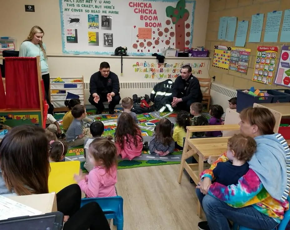 a group of children in a classroom