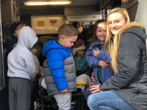 a group of people sitting in a bus