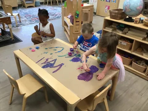 children sitting at a table