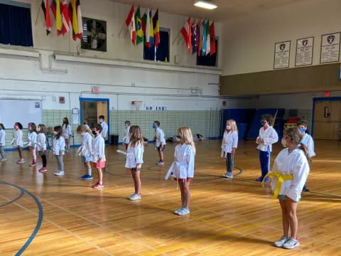 a group of children in a gym