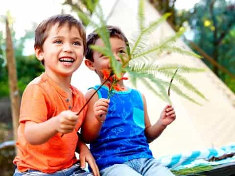 a couple of children playing outside