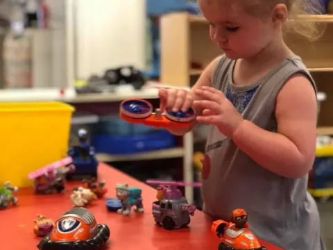 a child playing with toys