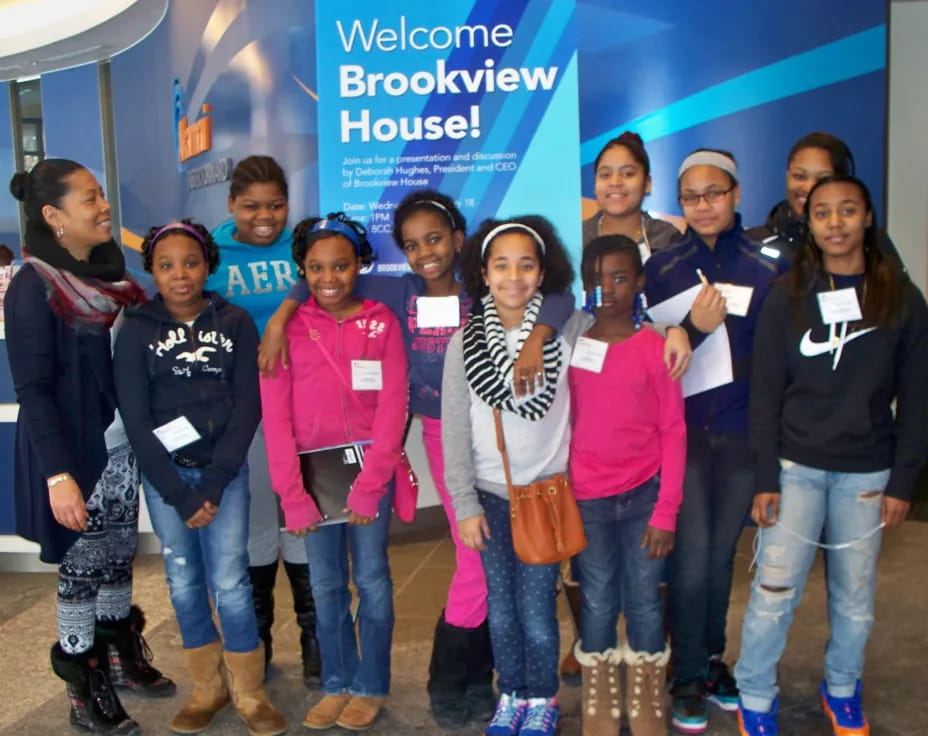 a group of people posing for a photo