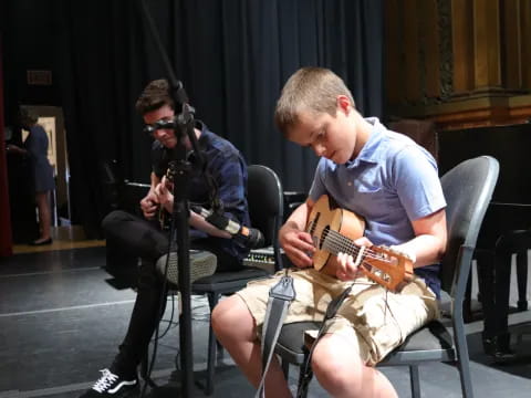 a man playing a guitar