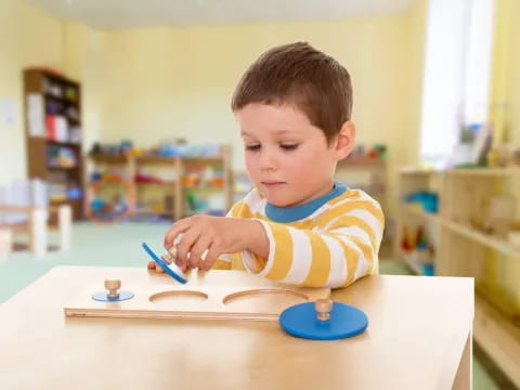 a child sitting at a table