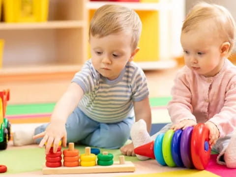 two children playing with toys