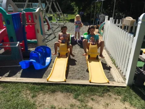 children playing in a play set