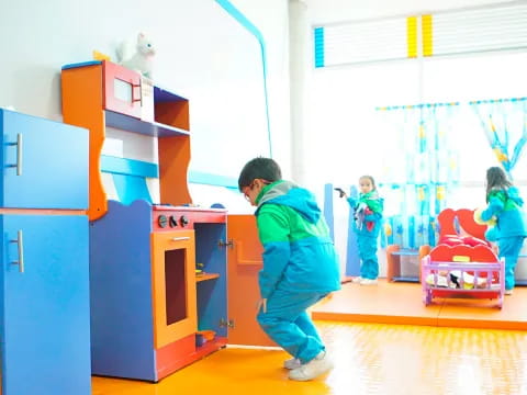 a group of kids playing in a room