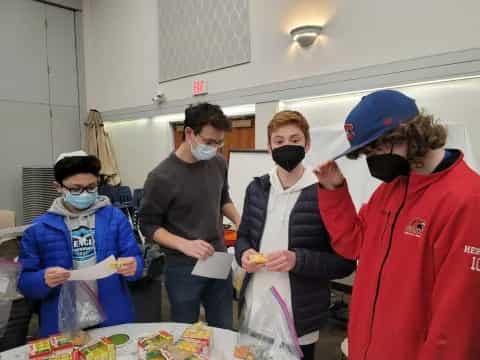 a group of people wearing masks