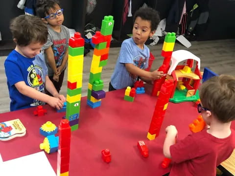 a group of kids playing with toys