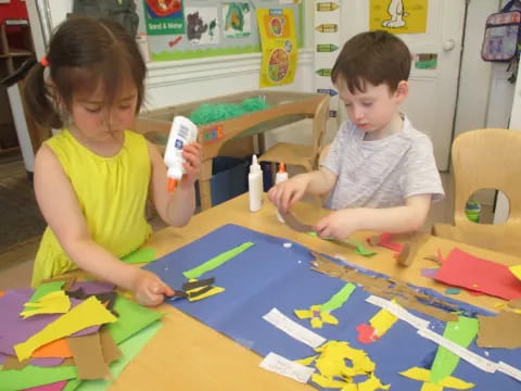 a couple of children playing with toys