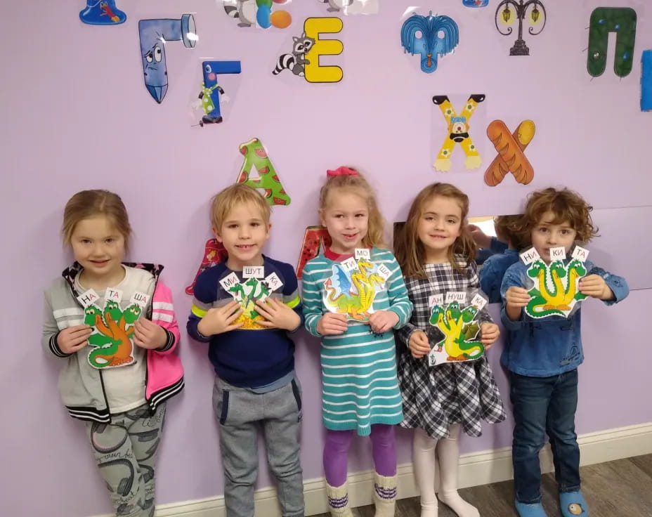 a group of children posing for a photo