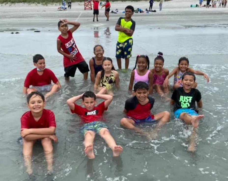 a group of people in the water