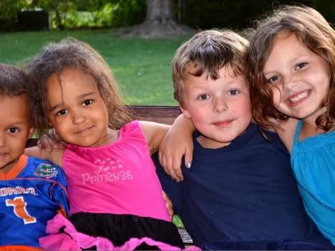 a group of children posing for a photo