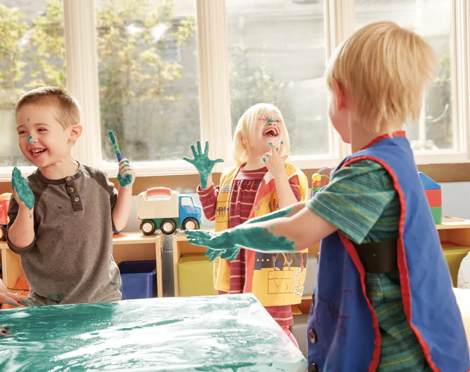 a group of kids playing with toys