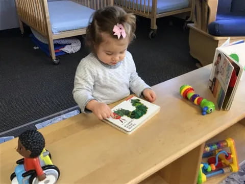 a child sitting at a table