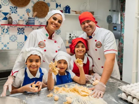 a group of people in a kitchen