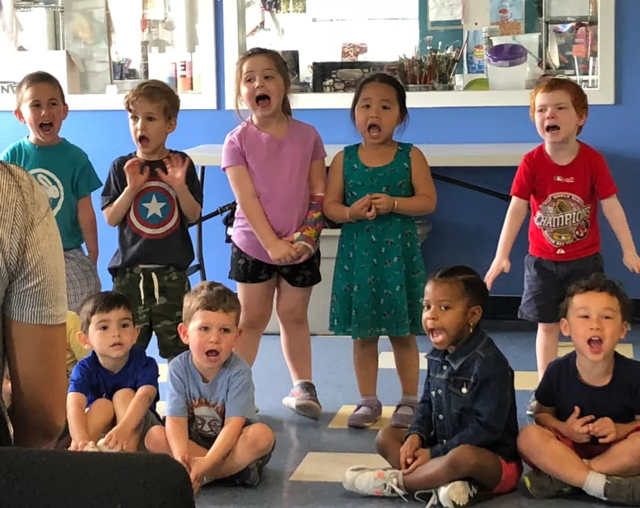 a group of children posing for a photo