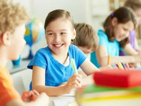 a group of children smiling