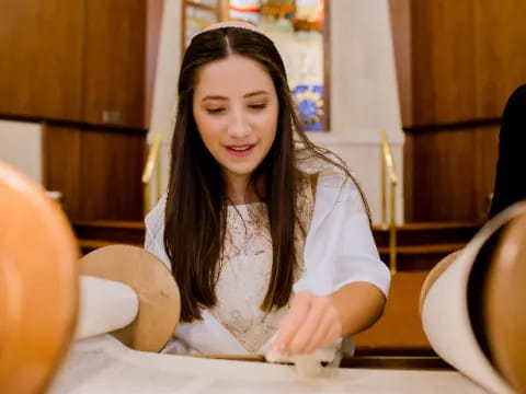 a woman sitting at a table