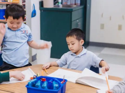 a few young boys painting