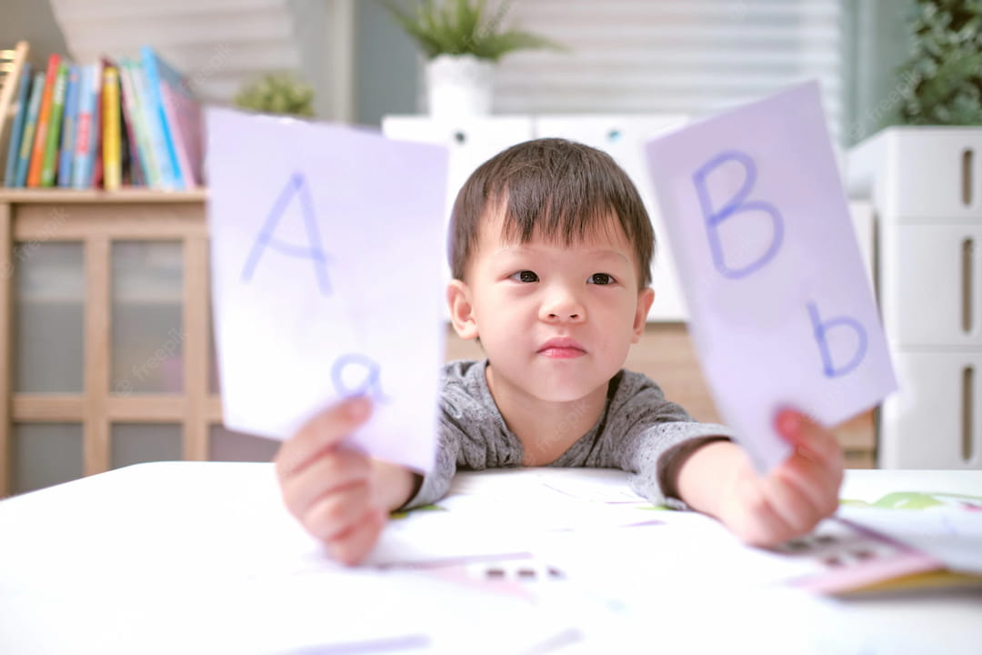 a boy holding a sign