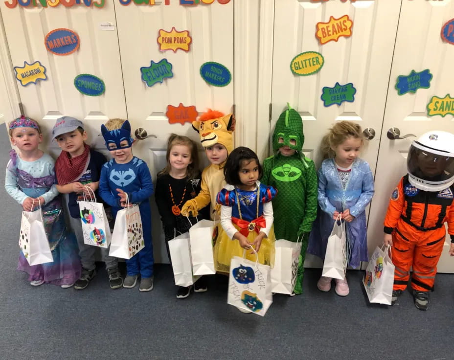 a group of children wearing clothing