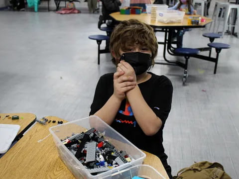 a boy wearing a vr headset