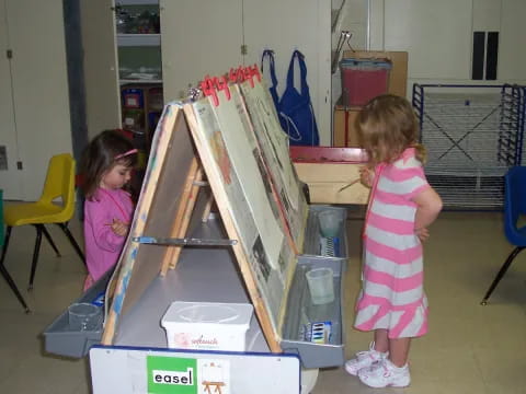 a couple of girls in a room