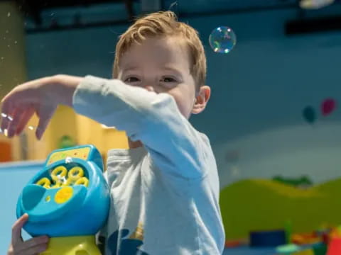 a child playing with a toy