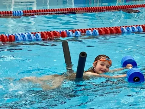 a person swimming in a pool