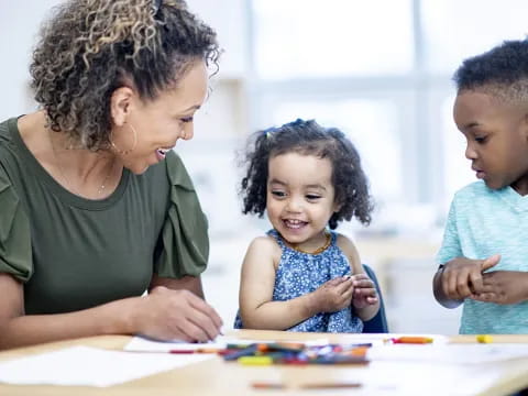 a man and a child looking at a paper