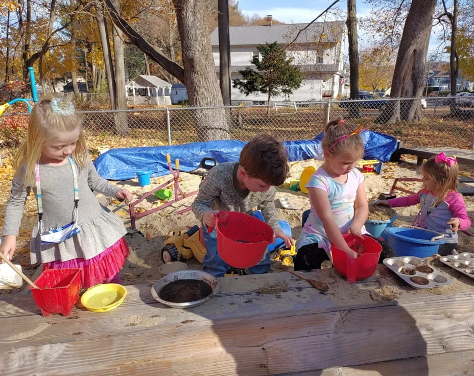 children playing in the sand