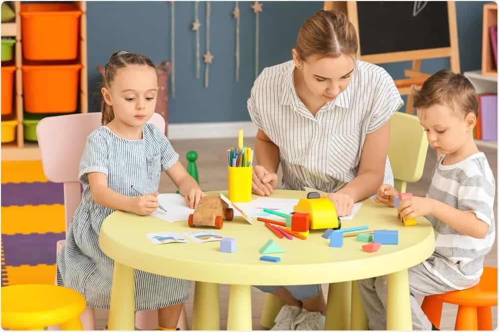a group of children playing with toys