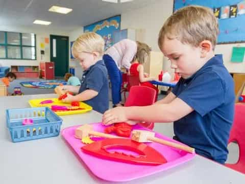 a few children playing with toys