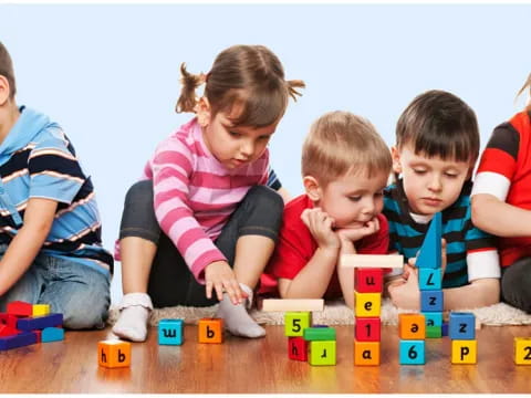 a group of children playing with blocks