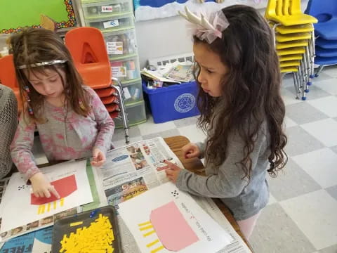 a few young girls studying