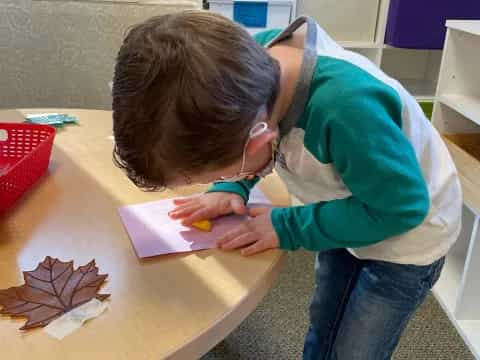 a person painting on a table