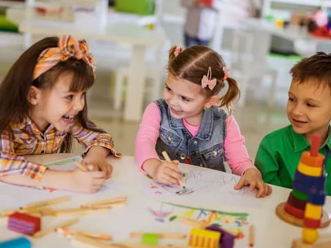 a group of children playing with toys