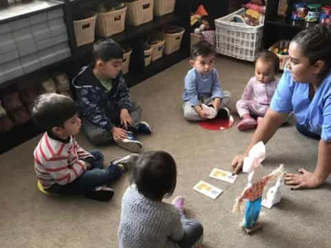 a group of children sitting on the floor