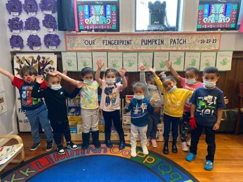 a group of children posing for a photo