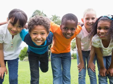 a group of children posing for a photo